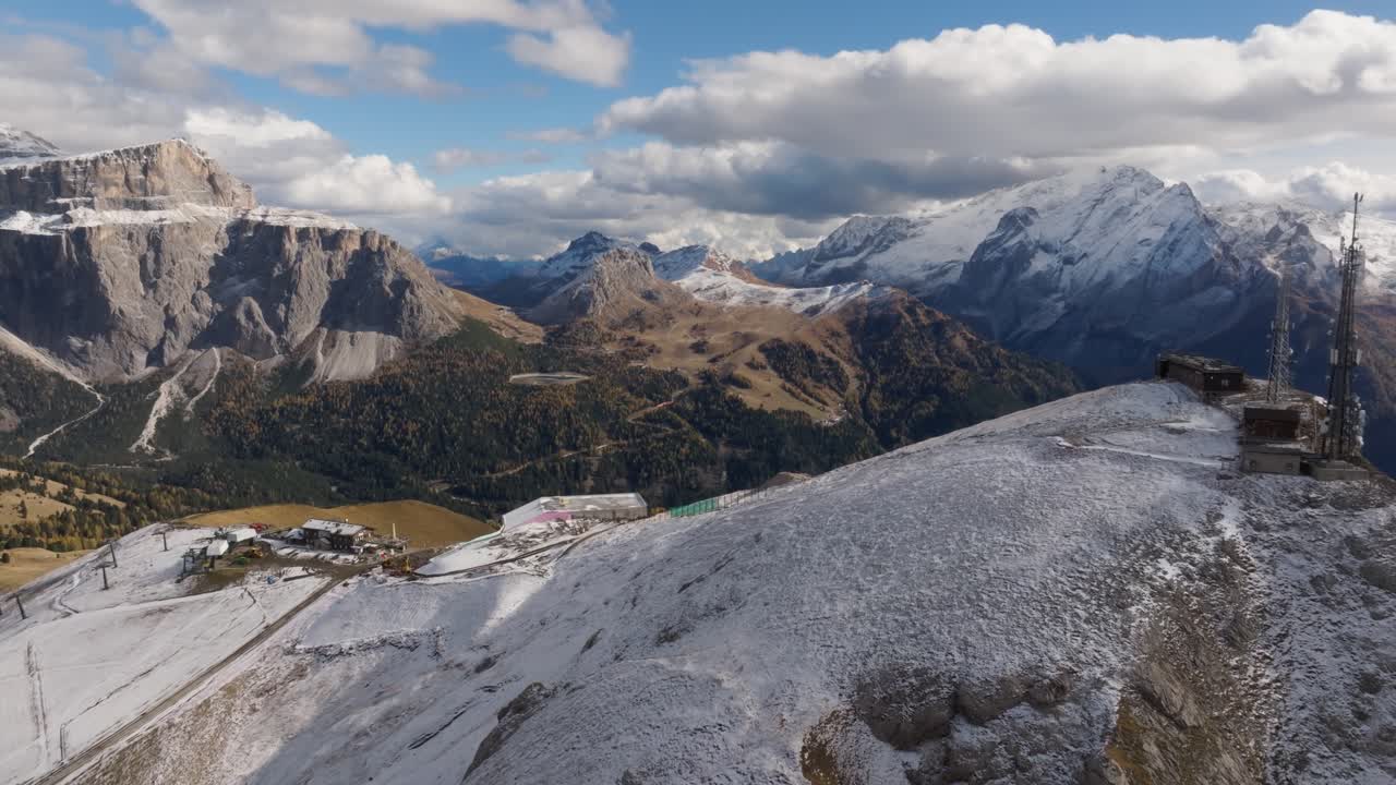 Revealing snowy mountains and colourful valleys near Sassolungo in the Italian Dolomites