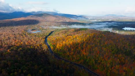 early morning views of the fall foliage in upstate new york from an aerial perspective