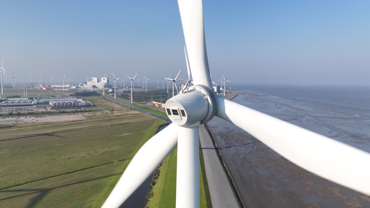 Wind turbines, sustainable energy in the Eemshaven, The Netherlands. Aerial drone view.