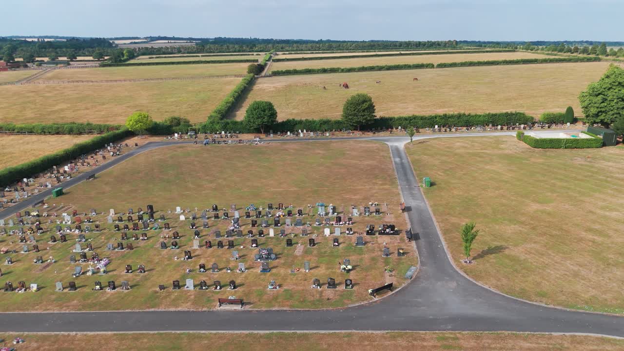 Aerial above graveyard resting place drone video Newmarket England United Kingdom