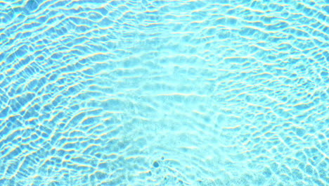 Vista-Abstracta-De-Arriba-Hacia-Abajo-Del-Agua-De-La-Piscina-Con-Reflejos-Solares,-Fotograma-Completo