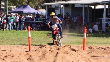 rider performs a jump over an obstacle