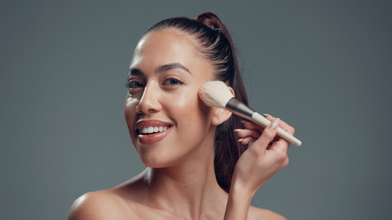 Woman Applying Makeup with Brush