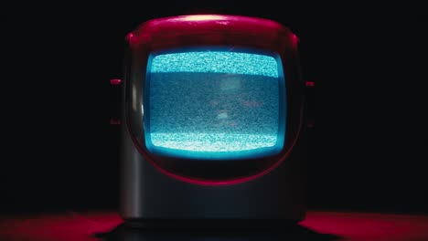 retro tv, vintage television in a nostalgic setup, a retro tv displays grain on screen, scary halloween night device good for chroma key and green screen. high quality 4k footage