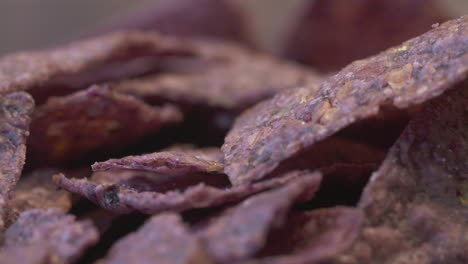 Macro-close-up-on-crispy-blue-nacho-chips