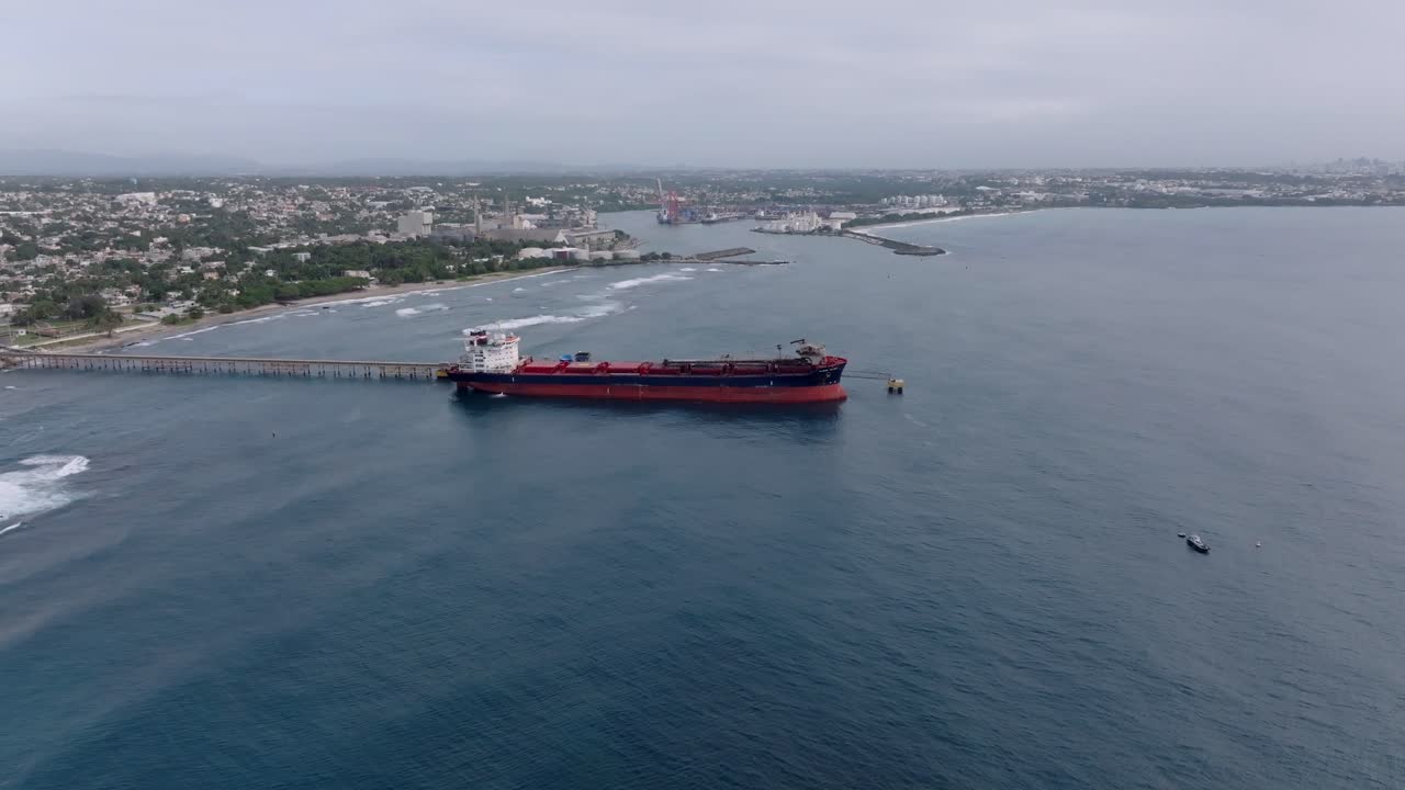Cargo Ship Dock At The Port Near Puerto Haina Oriental In Santo Domingo, Dominican Republic. - aerial shot
