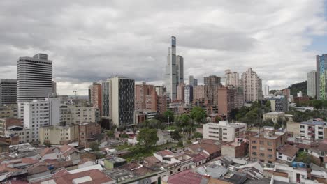 aerial - flying over colpatria tower , bogotá, colombia
