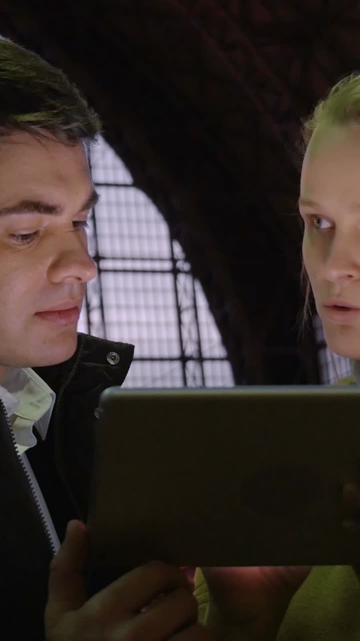 People looking at tablet