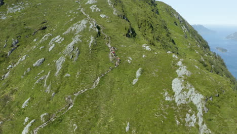 aerial footage of hornhelen in norway. this is an 860-meter tall cliff straight up from the fjords bellow