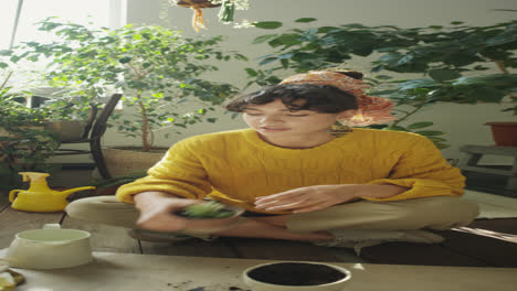 Girl Filming Vlog about Houseplant Care