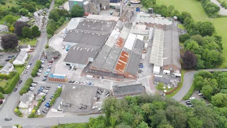aerial view of a large industrial complex and surrounding landscape