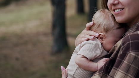 mother holding a baby
