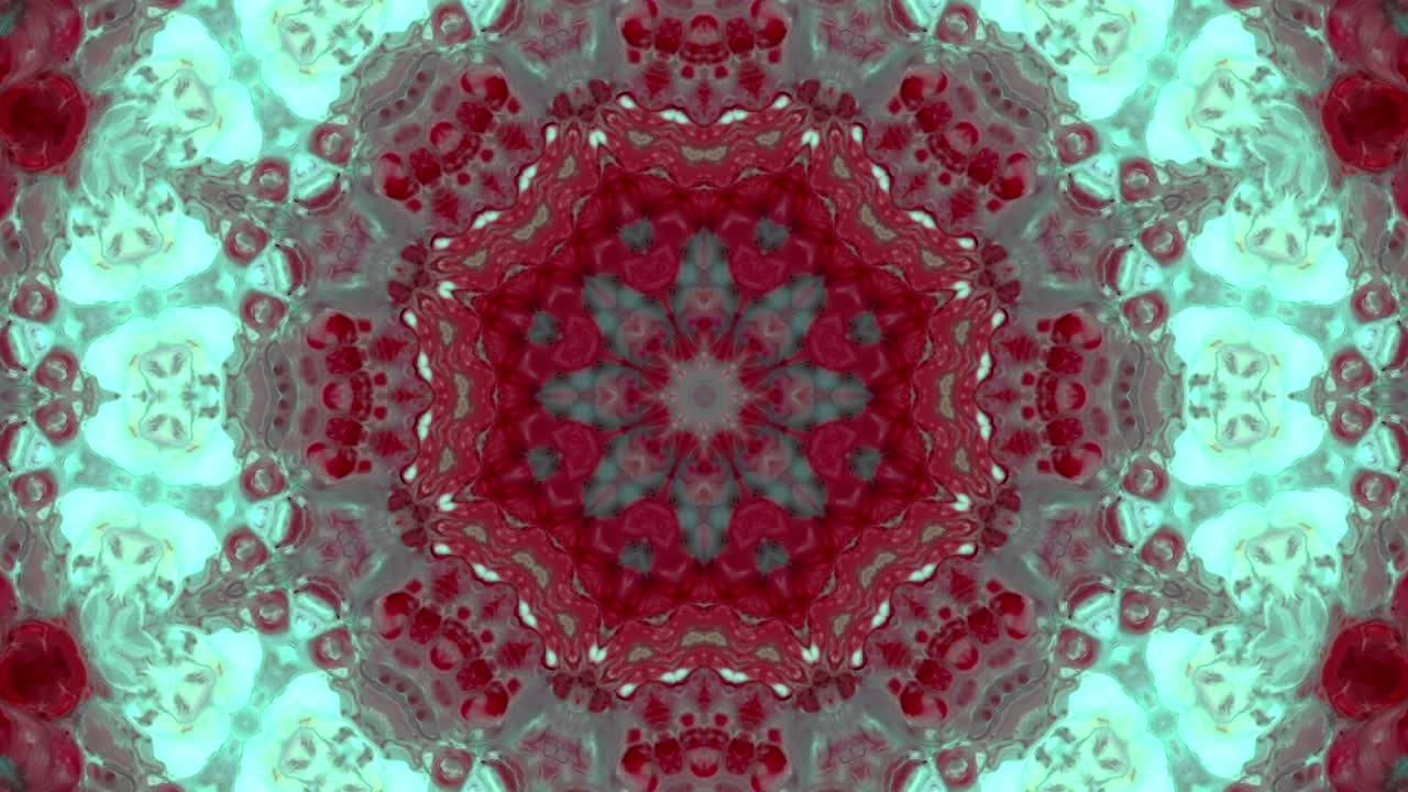 Movimento astratto caleidoscopico con forme geometriche di cerchi e stelle.