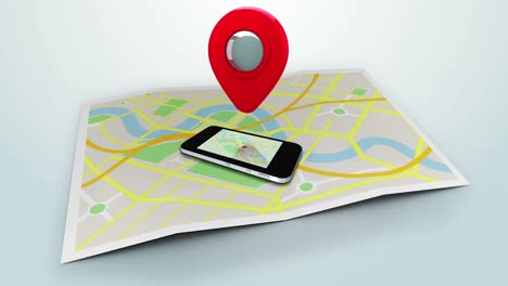 red marker pointing at a mobile lying on a map of a town