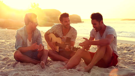 happy friends playing guitar