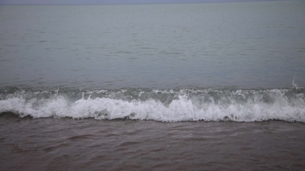 Beautiful Waves Splashing On The Shore In Canada - Wide Shot