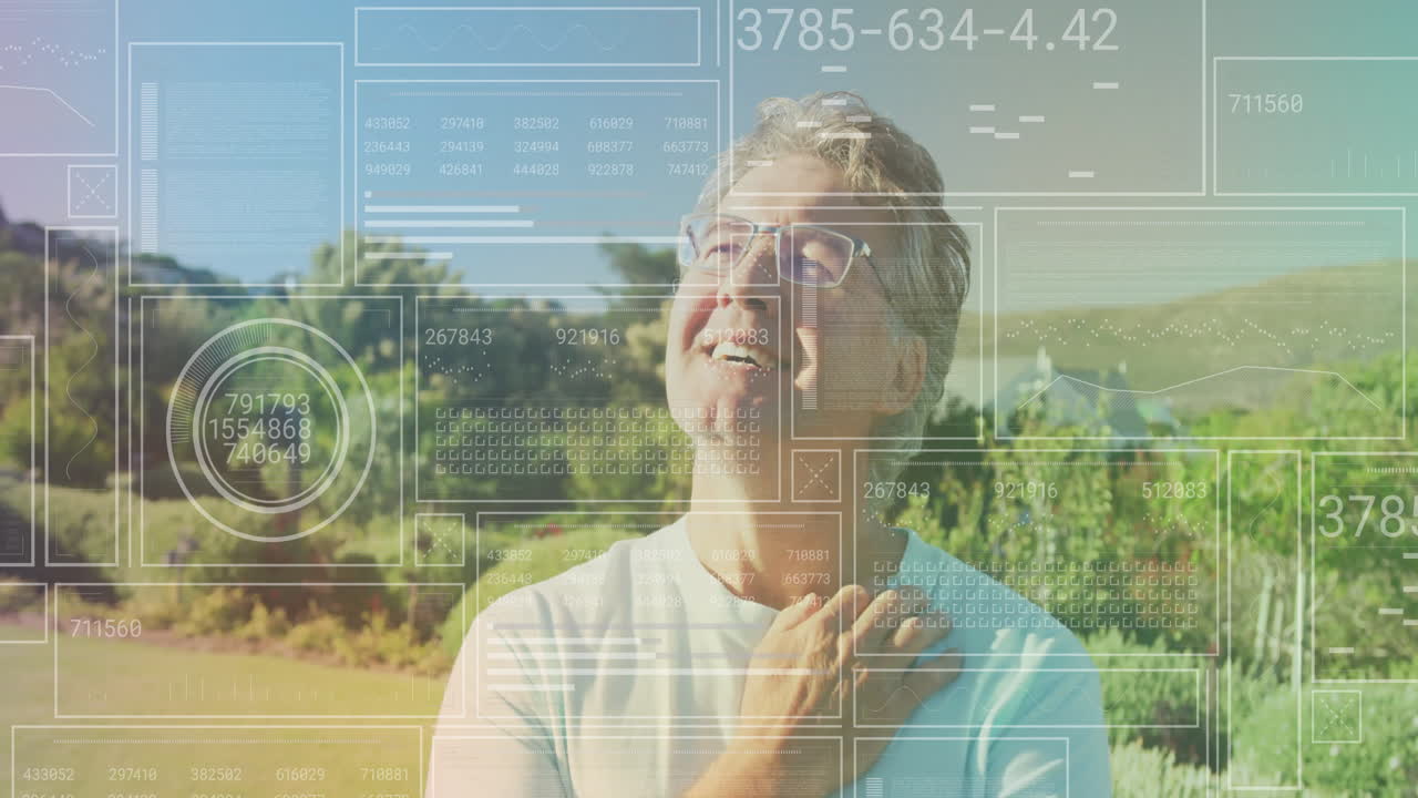 Man with eyeglasses tilting head back smiling in vineyard, showcasing tech HUD data charts grids