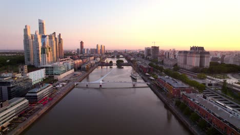 Iconic-Woman's-Bridge-Spanning-Rio-Darsena-Sur-At-Sunset-In-Buenos-Aires,-Argentina