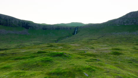Scenic Green Valley with Waterfall