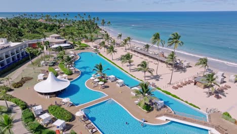 Luxurious-Hotel-And-Resort-By-The-Beach-With-Outdoor-Pool-In-Punta-Cana,-Dominican-Republic