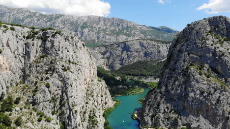 aerial drone shot of the cetina river and the canyon near the town of omiš, croatia