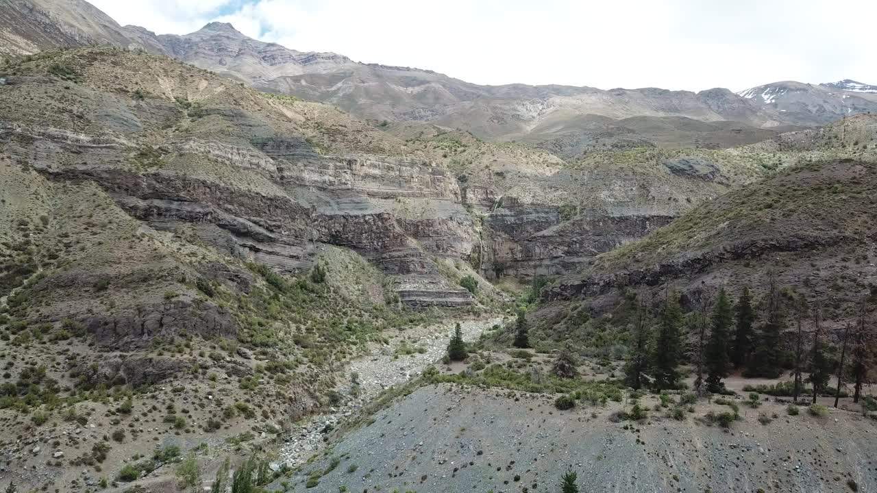 Dry Canyon and Rocky Eroded Hills. Aerial View of Chilean Landscape Under Ande Mountains