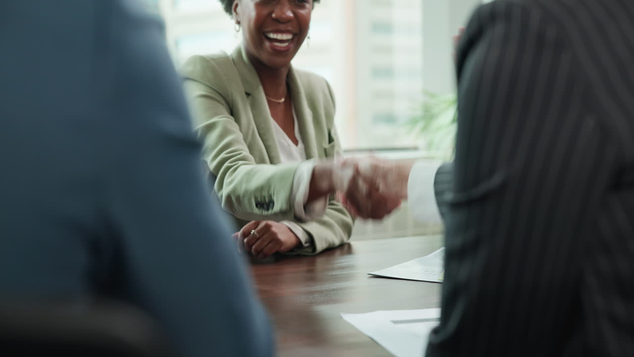 Business people shaking hands during a meeting