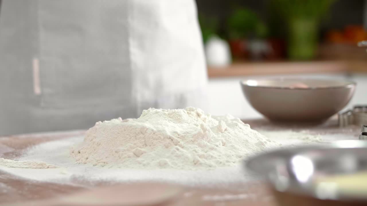 Woman's hands breaking an egg
