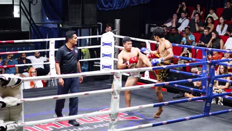 intense muay thai fight at night market