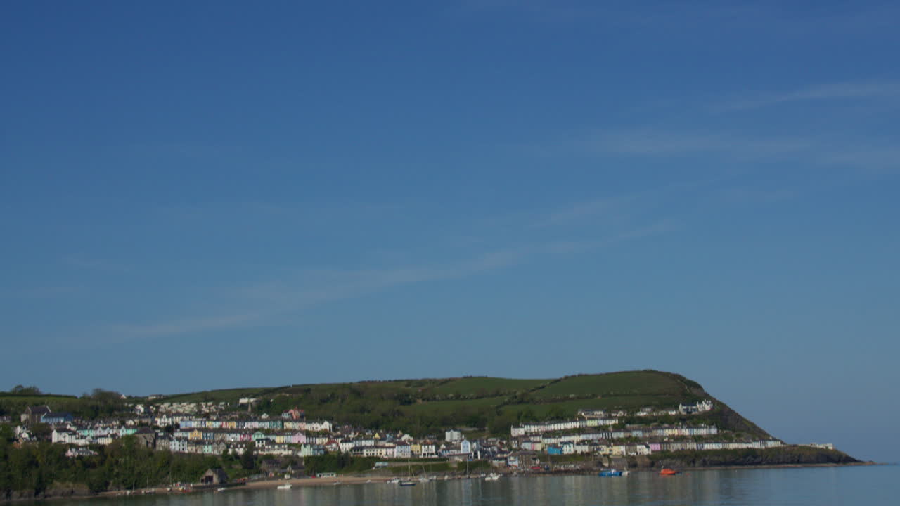 Tilting down shot of new quay bay with new quay in background