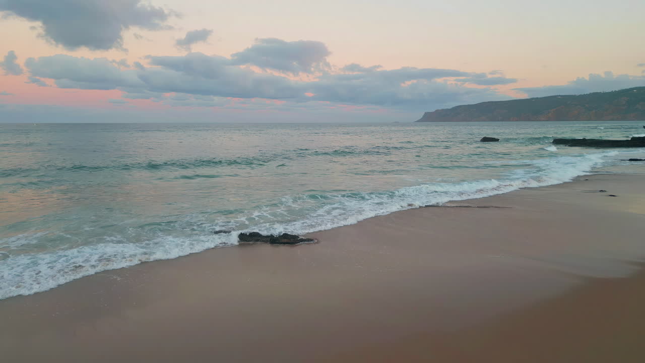 Tranquil ocean landscape aerial view. Twilight painting horizon with pink shades