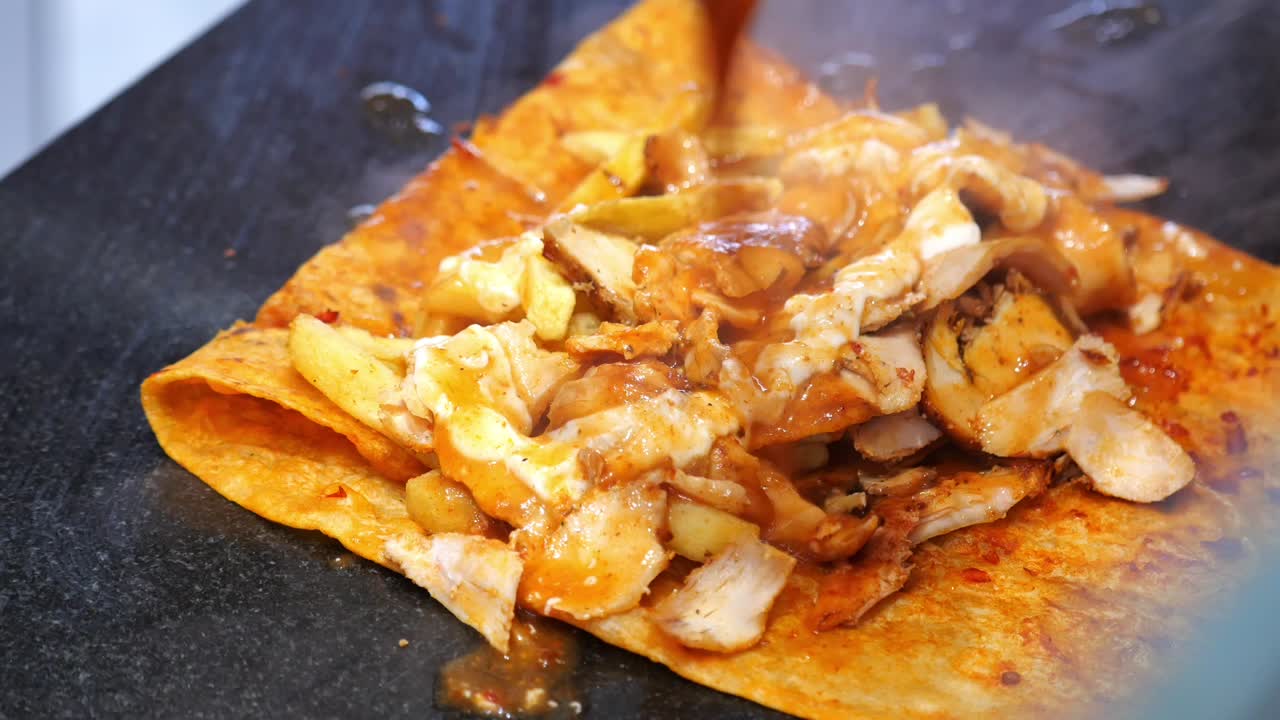 Döner kebab wrap with chicken and fries