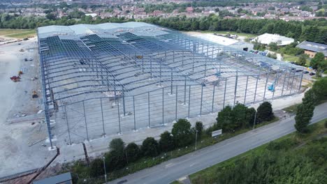 Industria-De-La-Construcción-Metal-Hierro-Viga-Almacén-Marco-Sitio-De-Construcción-Vista-Aérea-órbita-Inversa-Derecha