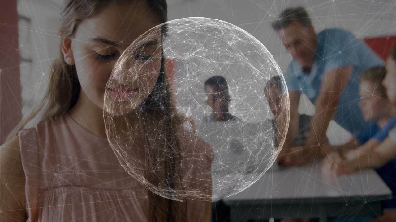Girl in pink tapping tablet in classroom, activating globe overlay centering over group learning
