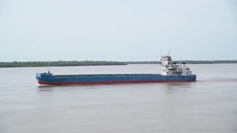 a barge floating on paraná river in argentina