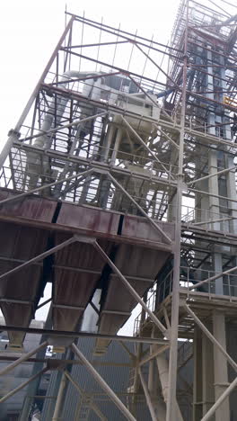 modern industrial plant. grain elevators on nature background