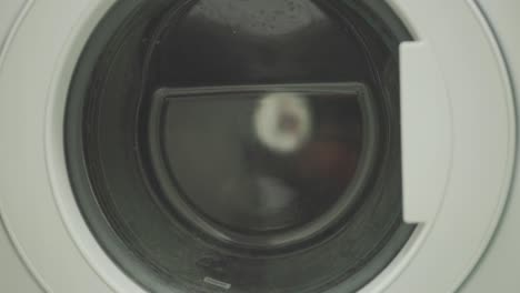 Front-loader-Washing-Machine-With-Laundry-Inside