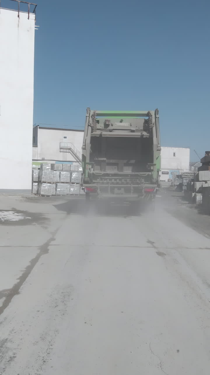 Garbage truck at a construction site
