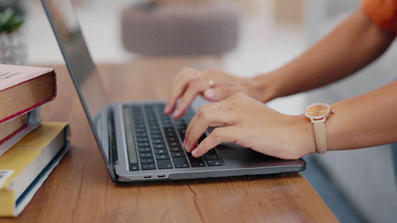 Hands of person, laptop and studying in home