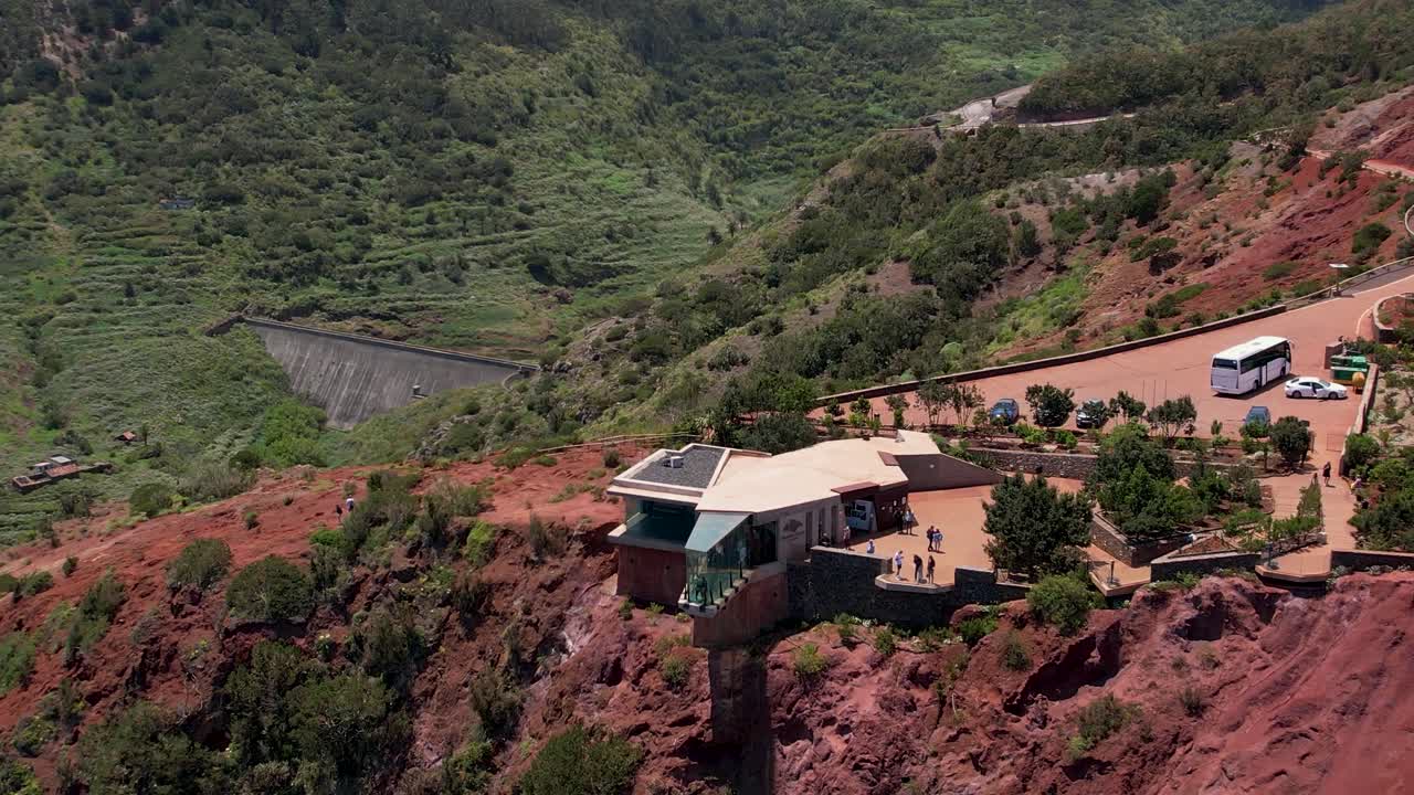 Rotating Aerial View Captures Mirador de Abrante Framed by the Red Rock Landscape of La Gomera, Spain