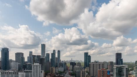 modern city buildings with summer clouds