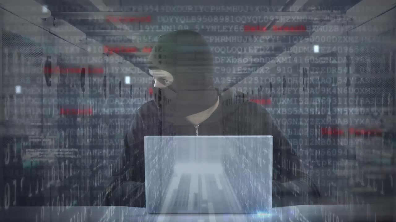 Animation of hooded man hacking a computer