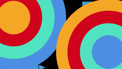 animación de lápices y círculos coloridos que se mueven sobre un fondo negro