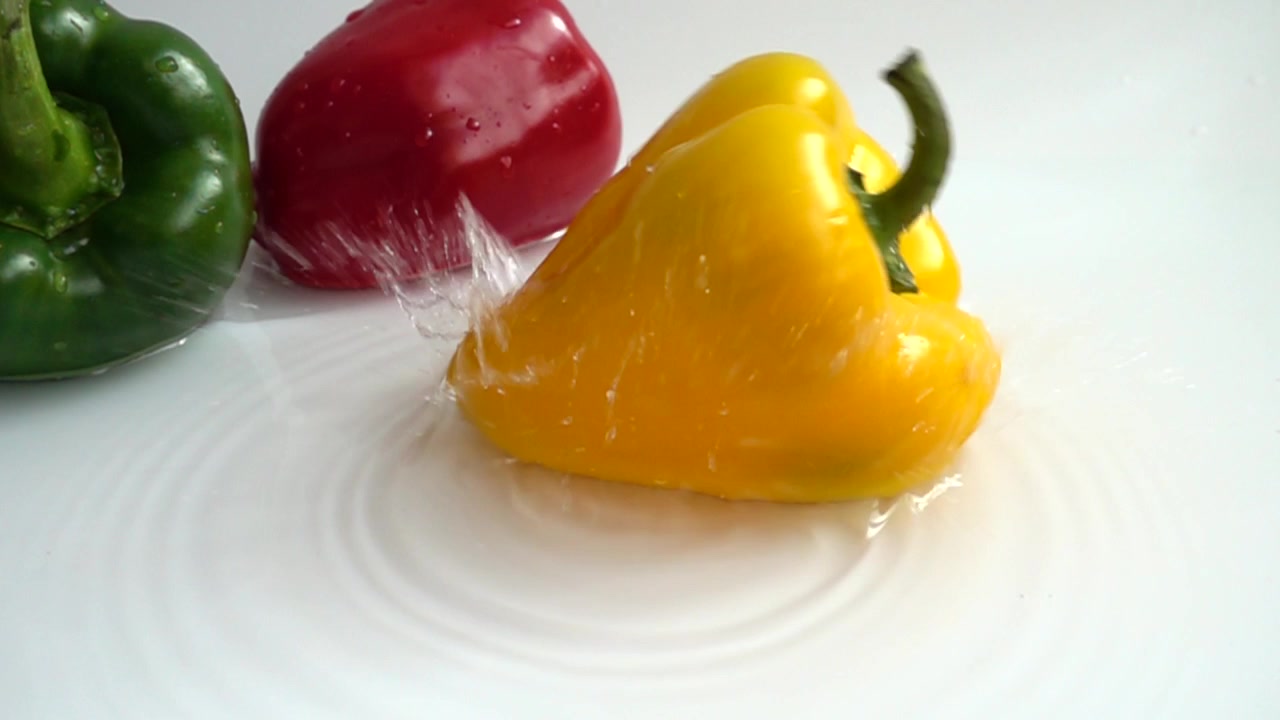 Juicy fresh pepper. Slow motion.