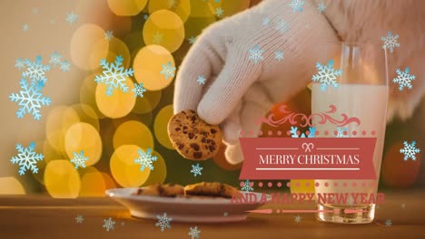 Animation-of-snow-falling-and-merry-christmas-text-over-santa-claus-taking-cookie