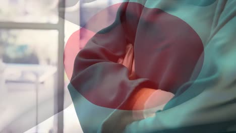 animación de la bandera de japón ondeando sobre el anestesiólogo en el quirófano