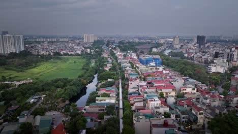 aerial view of a city with a train line running through it