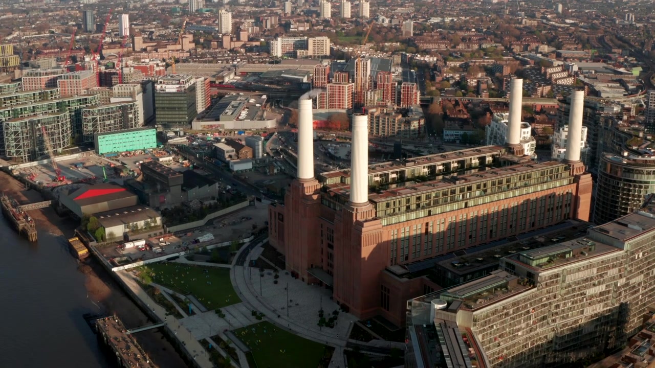 Pan down aerial shot over redeveloped Battersea power station