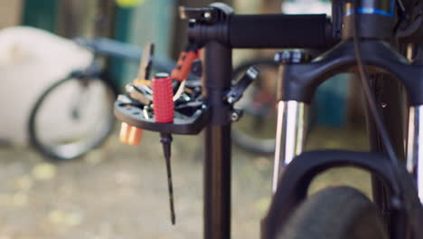 close-up of tools on bike repair stand