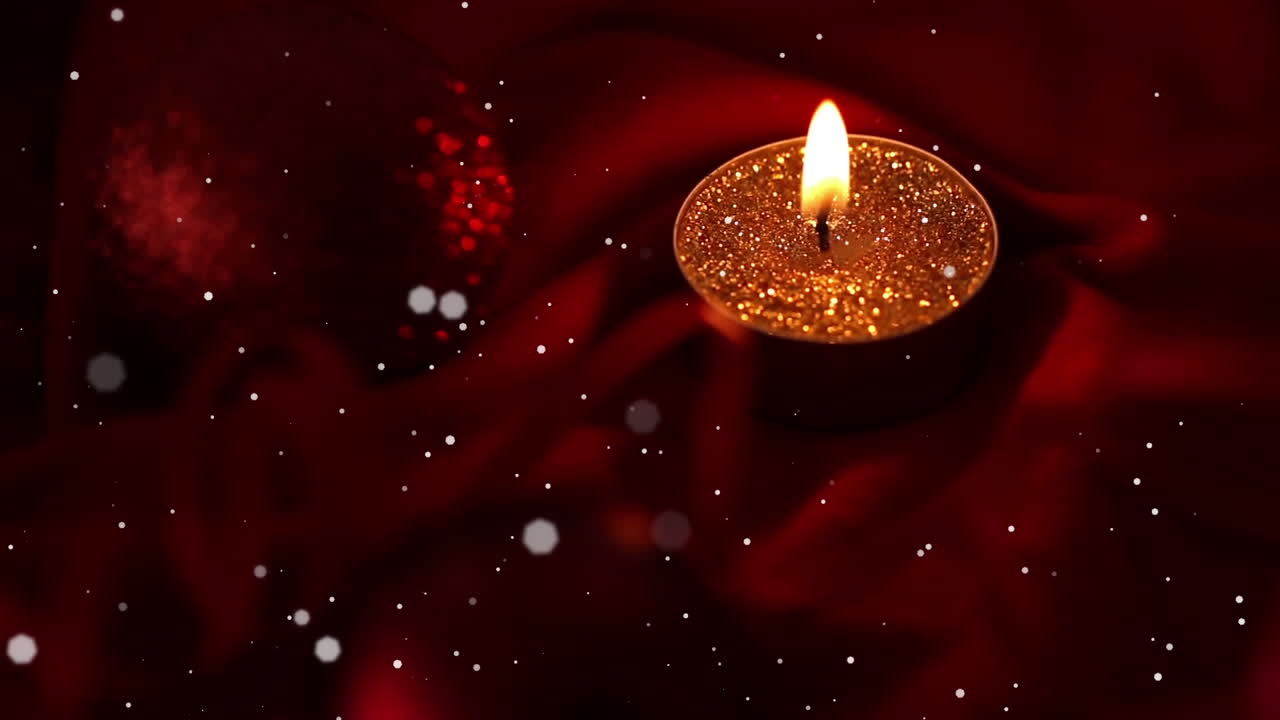 Animazione di punti di luce bianchi che si muovono su una candela tea light accesa, spenta